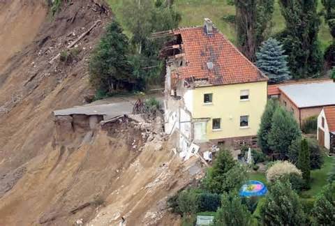 House built on sandy soil.  Erosion.